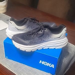 Woman hoka one one shoe
